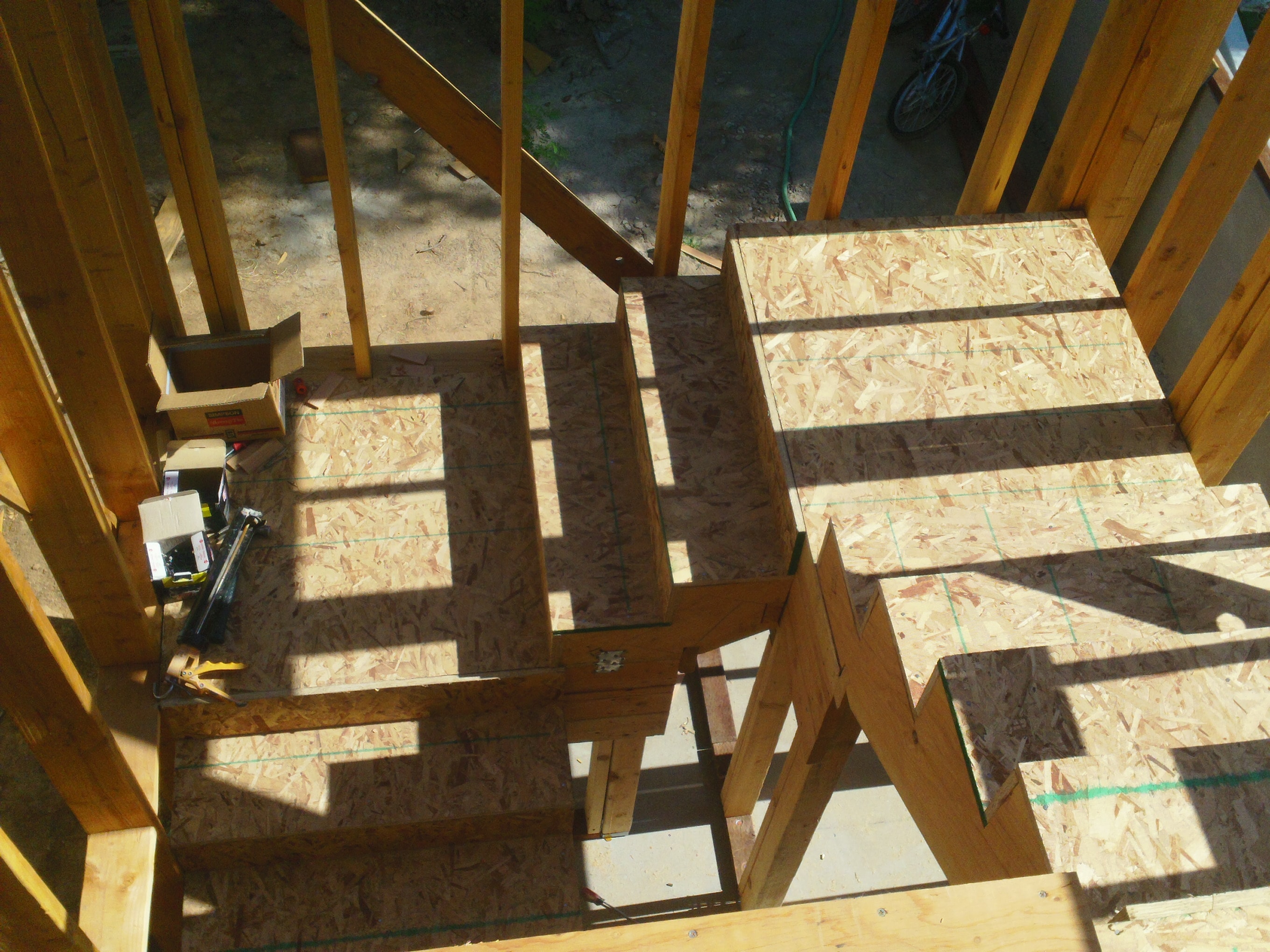 Wooden house frame under construction — HCIC