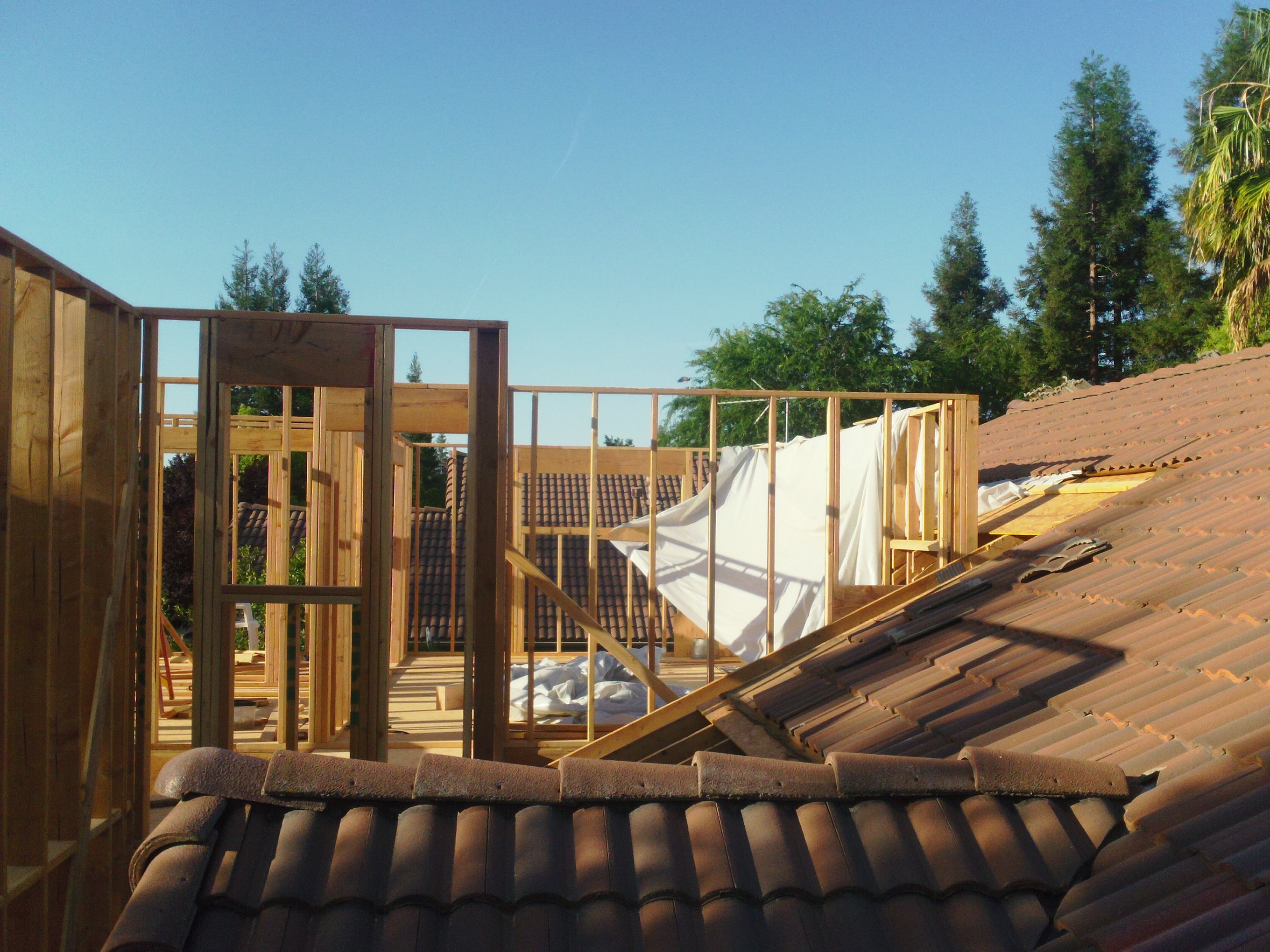 Home addition framing construction rooftop view — HCIC
