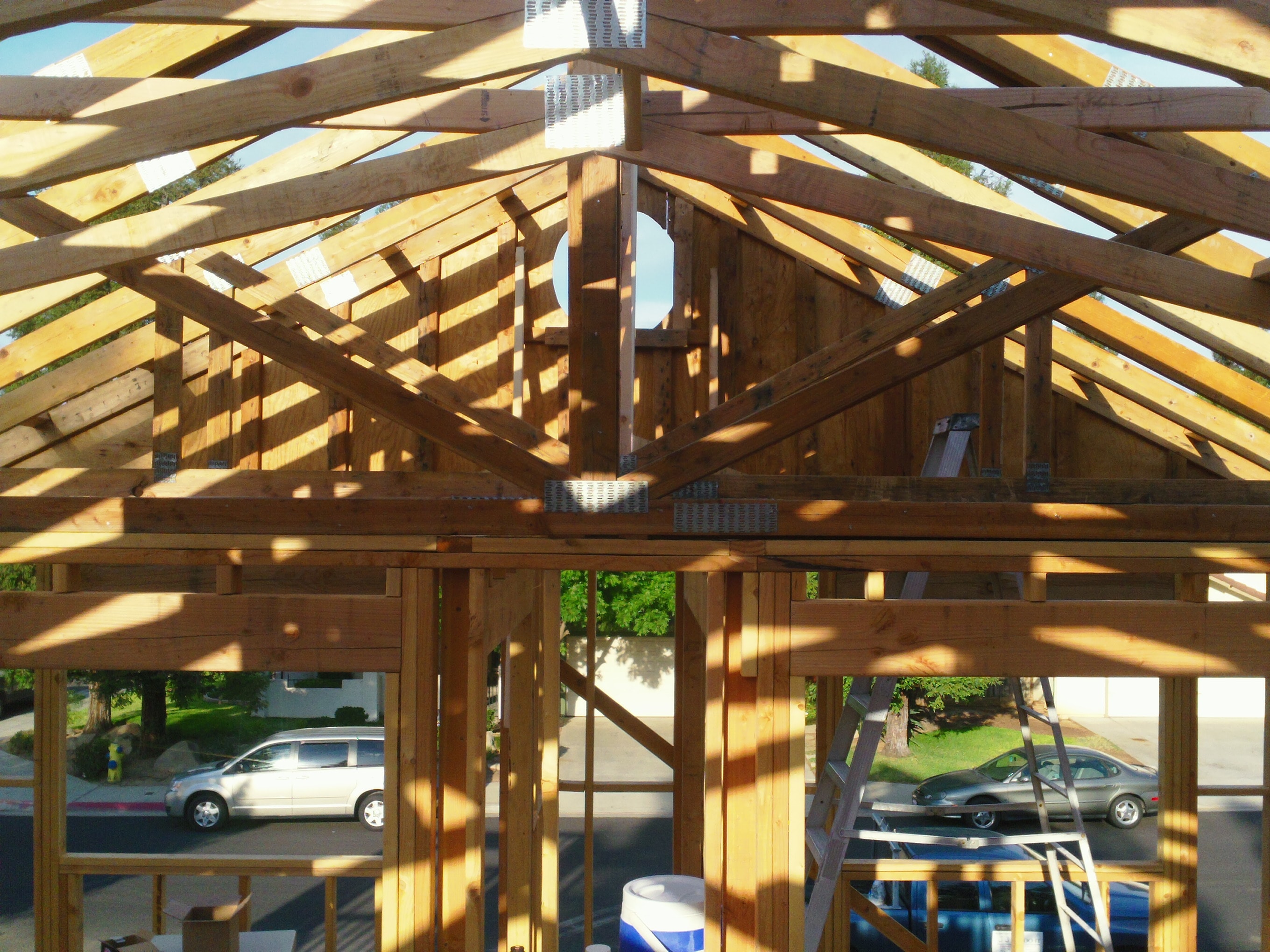 Wooden carport structure under construction — HCIC