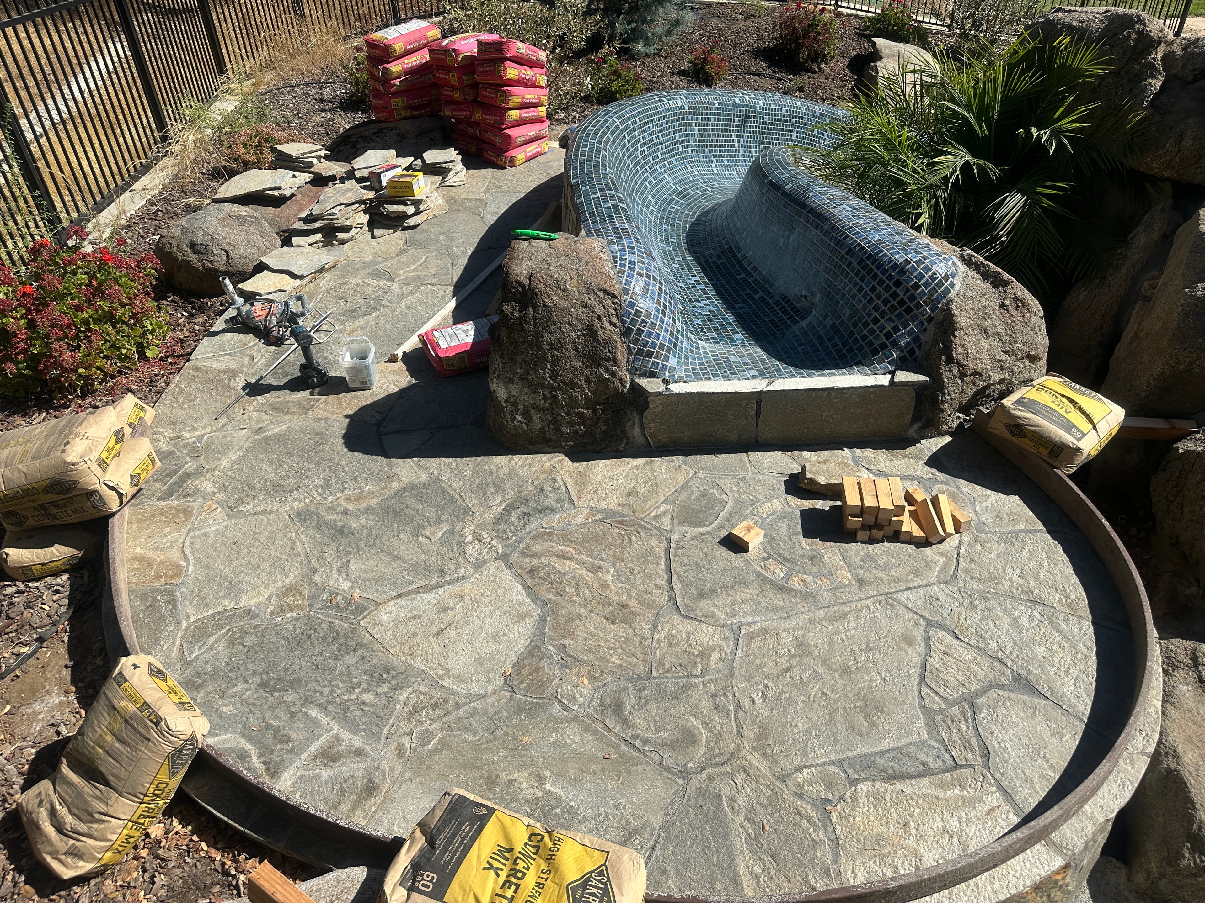 Pool construction with tiled spa feature — HCIC