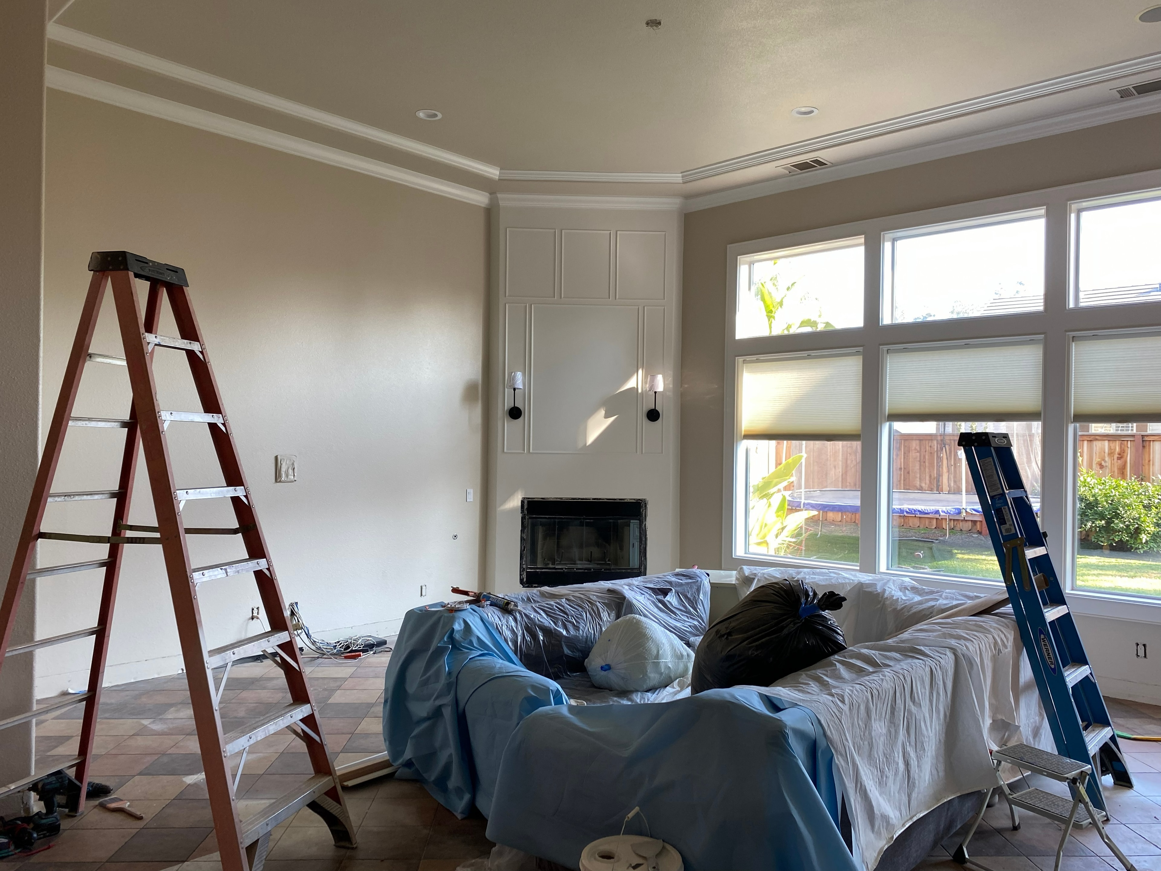 Home renovation in progress with ladders — HCIC