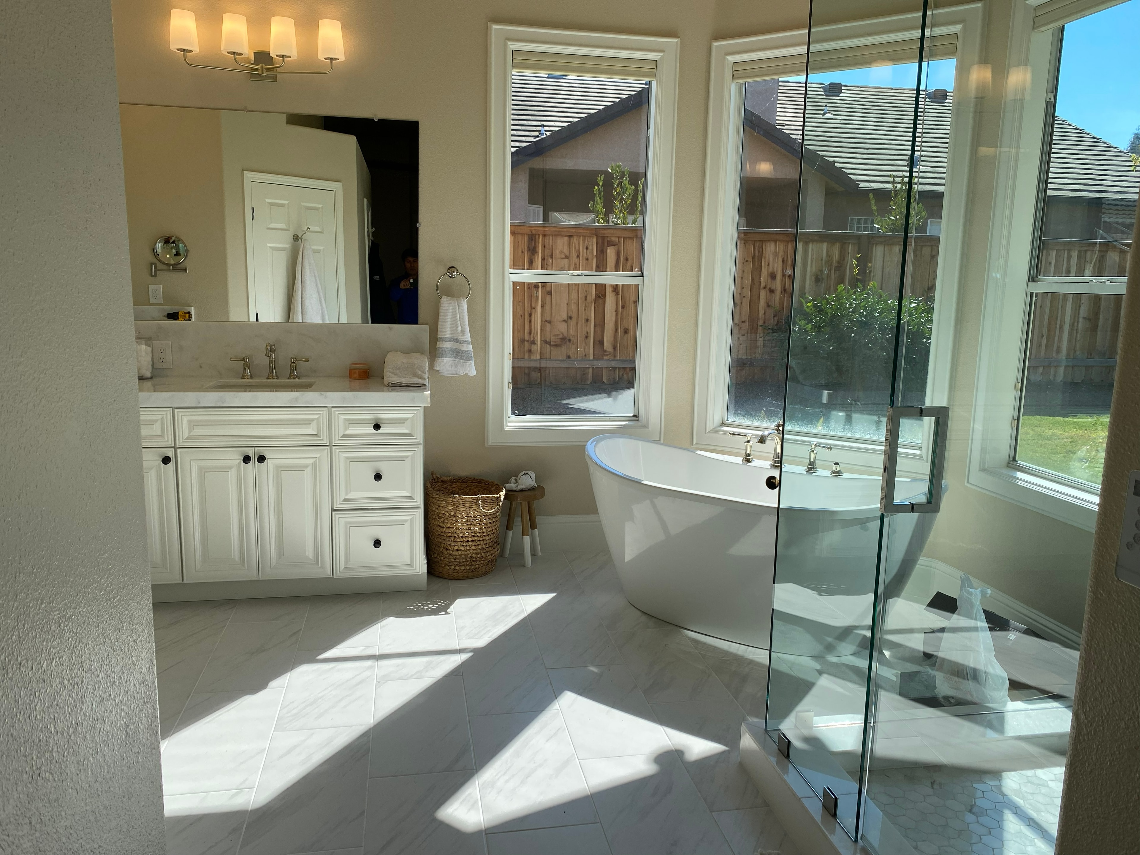 Modern luxury bathroom with freestanding tub — HCIC