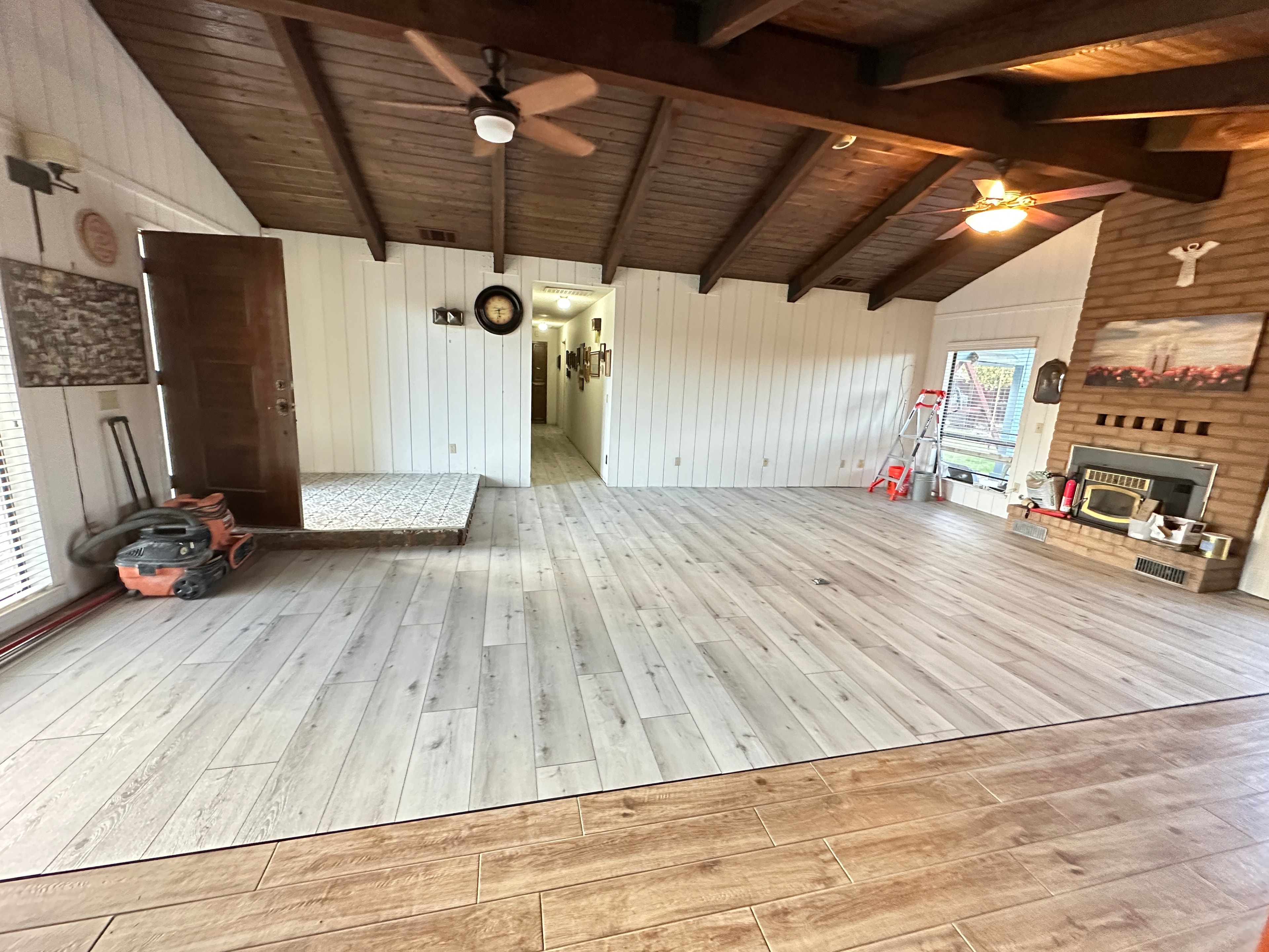 Spacious garage interior with wood beams — HCIC
